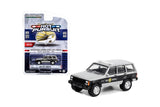 Jeep Cherokee 1995 Police Greenlight Hot Pursuit 1/64