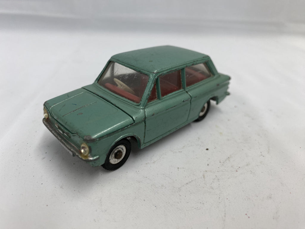 A boxed Dinky Toys No.138 metallic green Hillman Imp with red interior A boxed Dinky Toys No.138 metallic green Hillman Imp with red interior